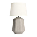 **Moderne tafel lamp met witte stoffen kap en gestructureerd keramisch voet**